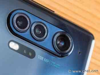 The Motorola Edge Plus looks smooth and sleek with its waterfall display     - CNET
