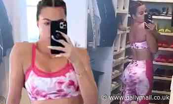 Khloe Kardashian shows off her toned tummy and shapely bottom