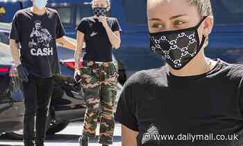 MIley Cyrus rocks Gucci facemask as she puts on PDA with Cody Simpson