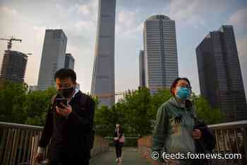 Chinese city ramps up coronavirus restrictions in country's biggest known outbreak since pandemic began