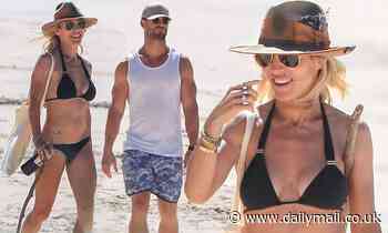 Chris Hemsworth and wife Elsa Pataky enjoy a leisurely coastal stroll - Daily Mail