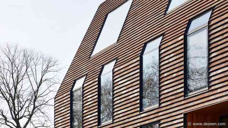 Peckham apartment blocks by Tikari Works are covered in rust-red shingles
