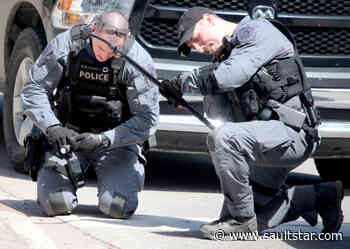 Police probe downtown stabbing: GALLERY