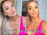 Khloe Kardashian shares two images in hot pink... after revealing she may have a second baby