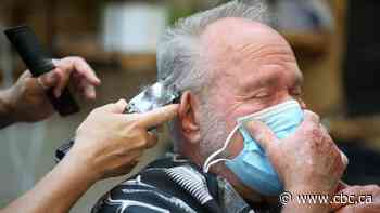 States test the waters of reopening as U.S. COVID-19 deaths surpass 50,000