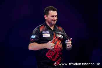 Key worker Jonny Clayton delivers on the oche - St Helens Star