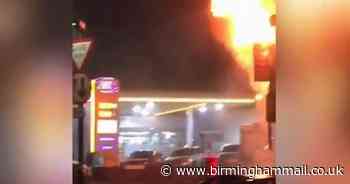Dramatic footage shows fire destroy flat next to petrol station and snooker club