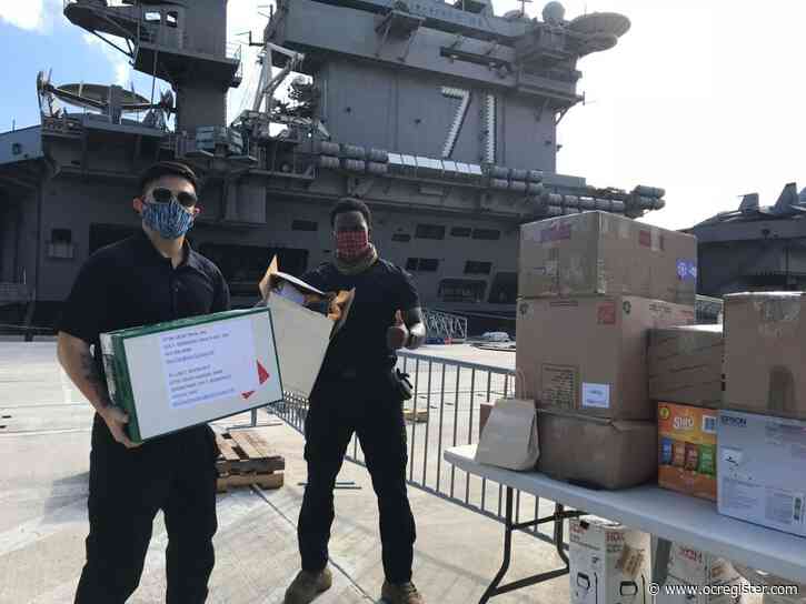 Sailors aboard the USS Theodore Roosevelt receive gift of handmade masks to guard against coronavirus