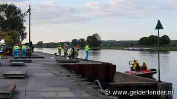 Vrouw in rolstoel valt in Maas bij Cuijk