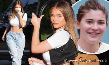 Kylie Jenner PICTURE EXCLUSIVE: Reality star flashes her toned tummy during glam appearance