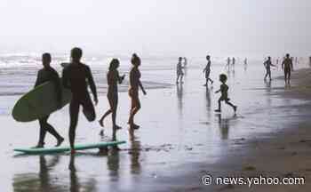 Tens of thousands descend on beaches amid California heatwave