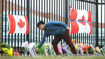 Families lay victims of N.S. rampage to rest, postpone public services