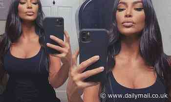 Kim Kardashian pouts her lips in throwback selfie from restroom