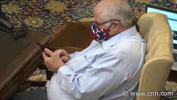 State lawmaker apologizes for wearing apparent Confederate flag face mask