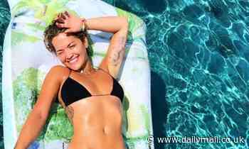 Rita Ora sizzles in throwback bikini snap before sharing a racy topless photo from a VMAs fitting