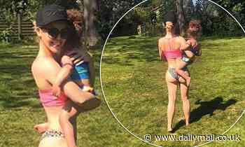Katie Piper flaunts her incredibly toned figure in a crop top and bikini bottoms