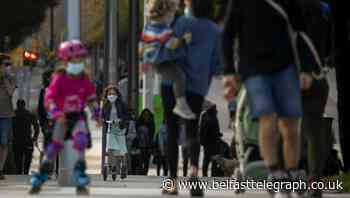 Children play outside in Spain as European countries work to ease restrictions
