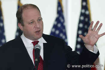 Colorado governor defends move to reopen