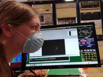 A massive asteroid is approaching Earth, and it looks like it's wearing a face mask