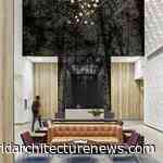 Crown Lobby’s interior 30ft metal screen creating abstract forest images