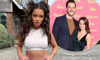 Maura Higgins flaunts her washboard abs in a tiny white crop top in sizzling snap