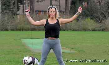 Danielle Mason works up a sweat for an outdoor exercise session with her pet pooch