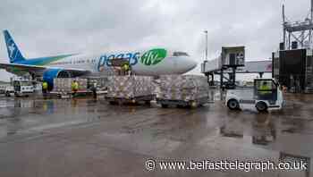 Fluid-resistant gowns arrive in Wales from Cambodia
