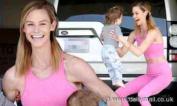 Meghan King Edmonds works out with her kids in garage