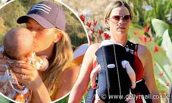 Teddi Mellencamp takes baby Dove for a hike in a carrier