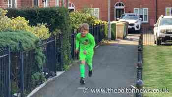 Bolton schoolboy runs marathon on his doorstep for NHS charity
