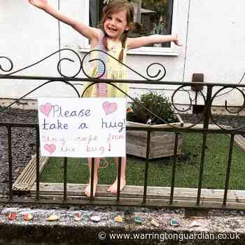 5-year-old girl makes 'hug' stones for passersby to make more people smile