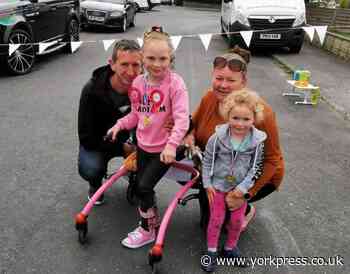 Emily, 7, is inspired by Captain Tom to raise £7,000 for NHS