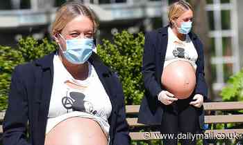 Chloe Sevigny, 45, puts her nine month belly on display during walk around NYC