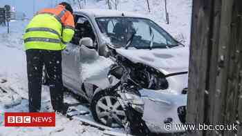 Schools and roads closed after heavy snowfall - BBC News