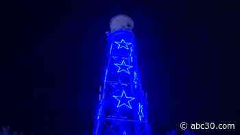 Fresno water tower lights up blue for World Wish Day