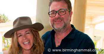 Kate Garraway says husband 'still with us' as he fights for life with Covid-19