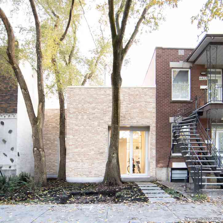 TBA adds pale brick volume to traditional Montreal "shoebox" home