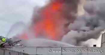 Huge scrapyard fire sends flames and smoke into air - drivers warned