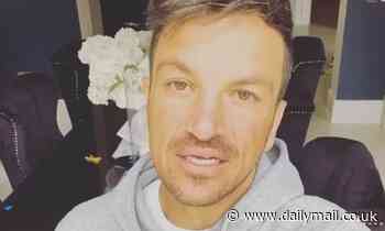 Peter Andre gets spooked after black cat sneaks into the garden while children make 'magic potions'