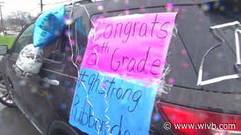 West Seneca 8th graders are celebrated with a drive-through ribbon ceremony