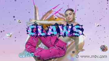 Charli XCX Dances With Digital Butterflies And Robotic Snakes In ‘Claws’