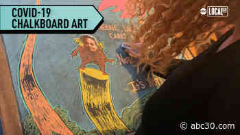 Chalkboard art brightens street during COVID-19 pandemic