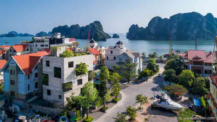 Trees burst through walls of Ha Long Villa by Vo Trong Nghia Architects