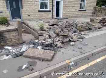 Car demolishes 10m wall in front of house in early hours crash in Bolton