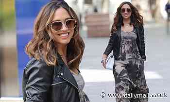 Myleene Klass oozes glamour in loose-fitting printed dress and white Chanel handbag