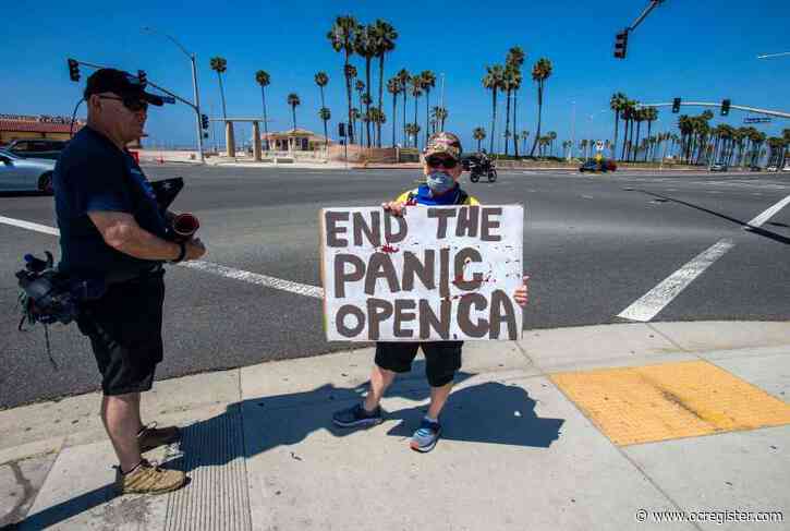 Huntington Beach: Helicopter, police, lifeguards on patrol Saturday to discourage sunbathers and surfers
