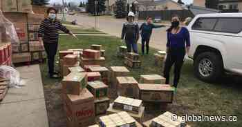 Edmonton Filipino community rallies to bring groceries to quarantined meat-plant workers in High River