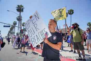 Thousands storm California beaches to protest closures
