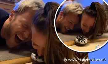 Olly Murs and girlfriend Amelia Tank race to win doughnut in latest TikTok challenge