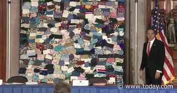 Andrew Cuomo unveils collage of donated face masks, drawing praise and criticism